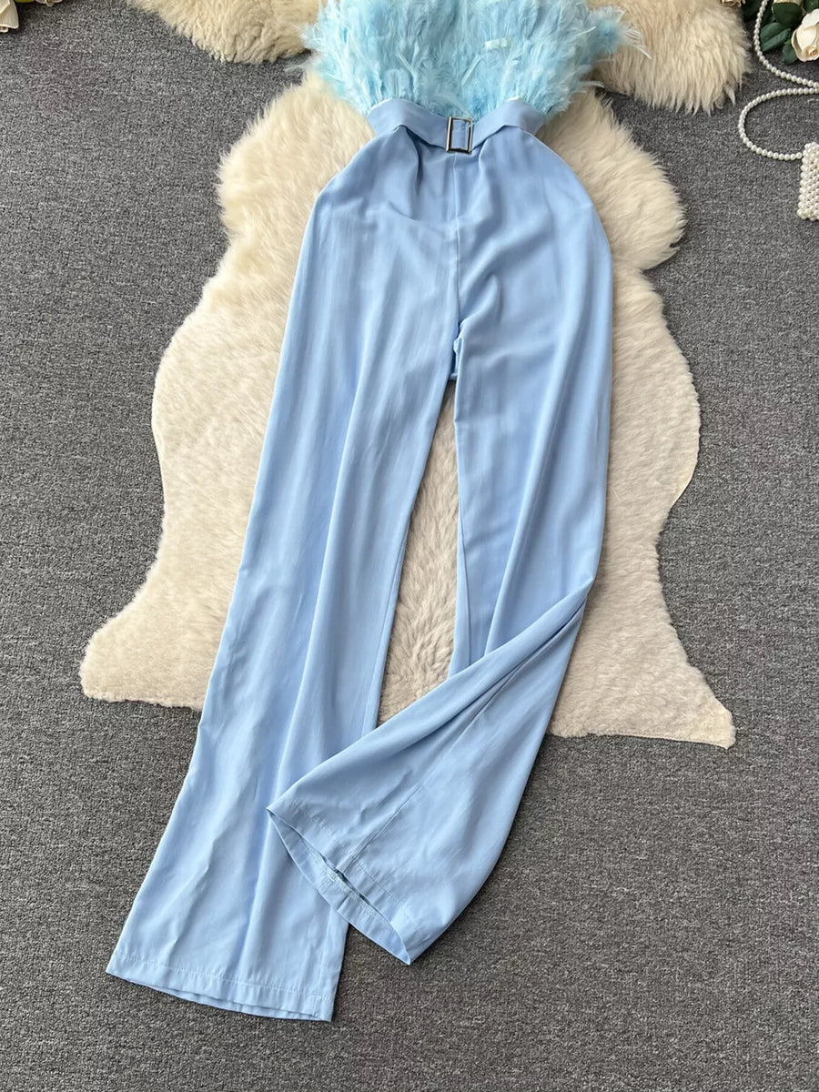Strapless wide-leg jumpsuit in blue with feather trim and belt detail