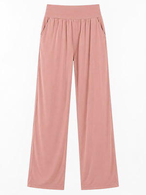Polyester and spandex blend wide-leg pants in Brick Red with relaxed silhouette