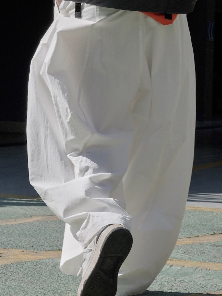 Cotton content is at least 95% wide-leg pants in Army Green with wide-leg silhouette