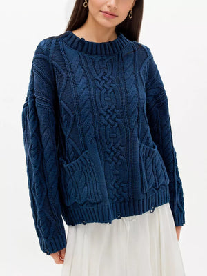 100% Acrylic Care instructions: Machine wash cold pullover sweater in Ivory with relaxed silhouette