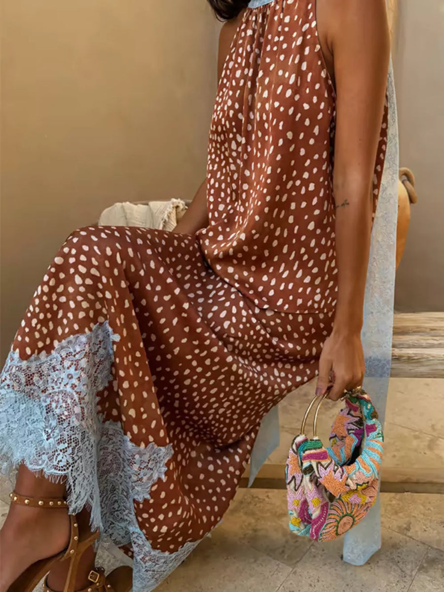 Brown polka dot maxi skirt with light blue lace trim and high neckline top.