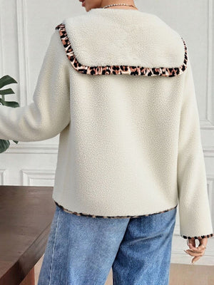 cream jacket with waist-length and button-front