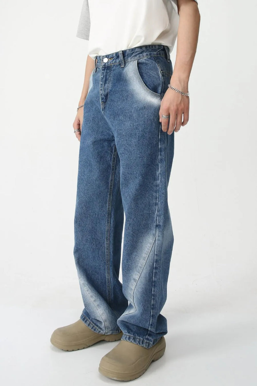Faded Panel Wide-Leg Jeans in medium wash denim with a relaxed fit and faded panel details.