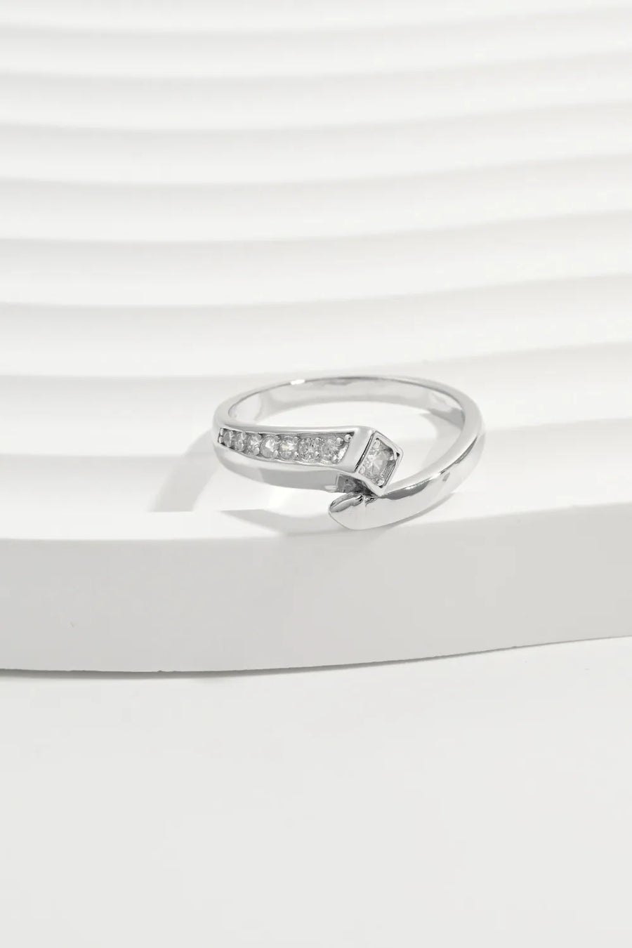 Silver asymmetrical ring with zirconia bar detail