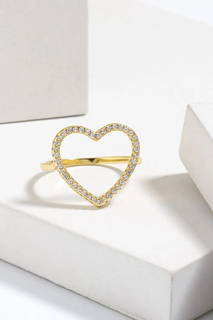 Gold pavé heart outline ring with clear stones, 18k gold-plated.