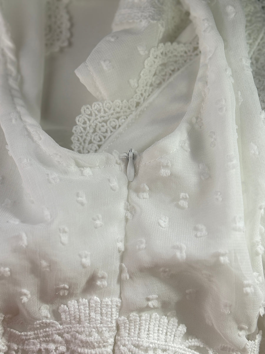 White swiss dot dress with lace trim and zipper