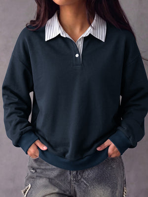 100% polyester Care instructions: Machine wash cold sweatshirt in navy blue with relaxed silhouette
