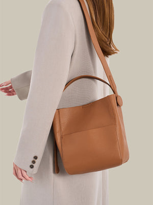 PU Leather Imported Size & crossbody bag in White with bucket silhouette