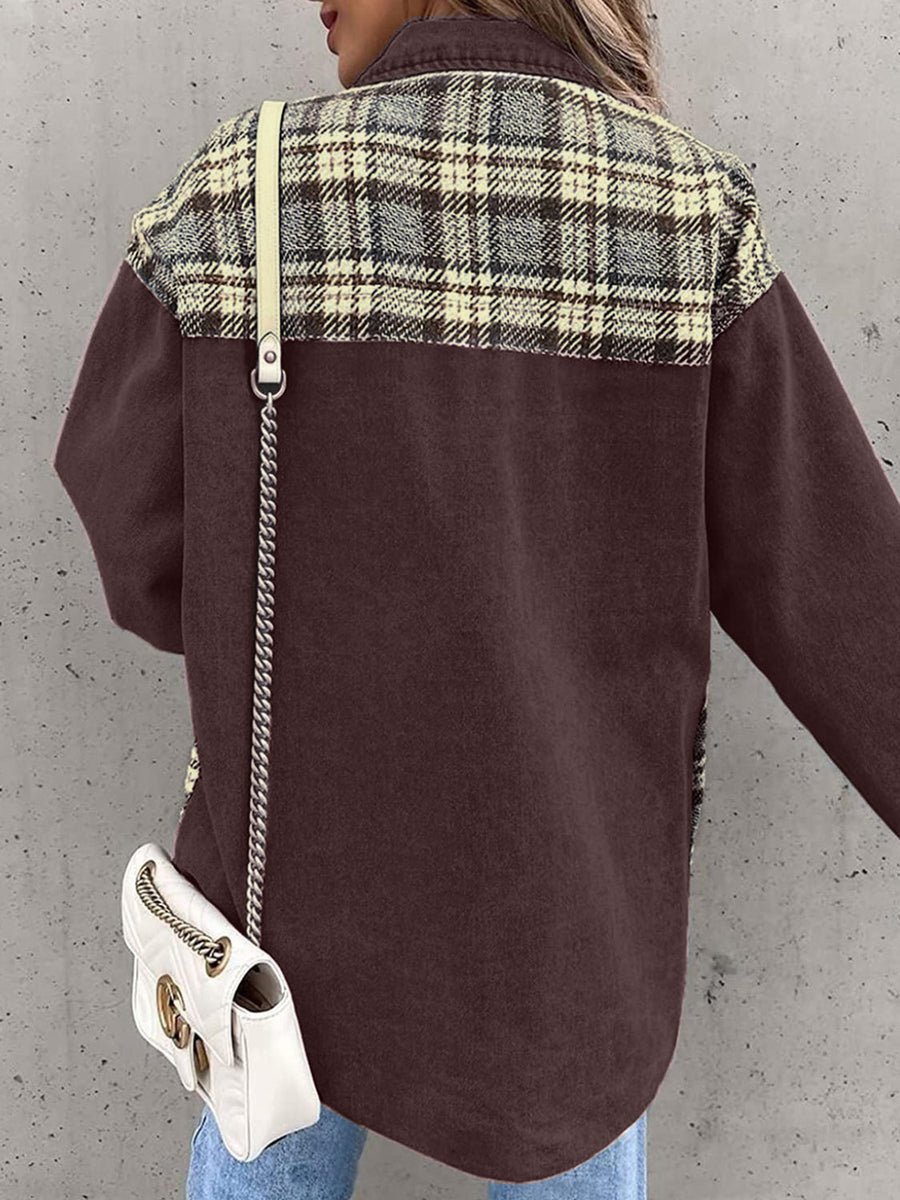 Brown denim jacket with plaid paneling on shoulders, buttoned front, casual styling.