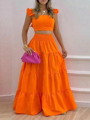 Orange ruffled crop top and tiered maxi skirt set with smocked waist