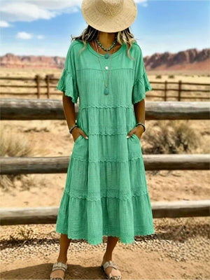 Blue midi dress with lace detail and short sleeve