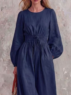 100% polyester Care instructions: Machine wash cold jumpsuit in Black with relaxed silhouette