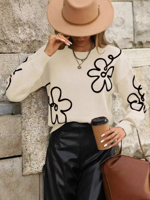black pullover sweater featuring dropped shoulder and floral