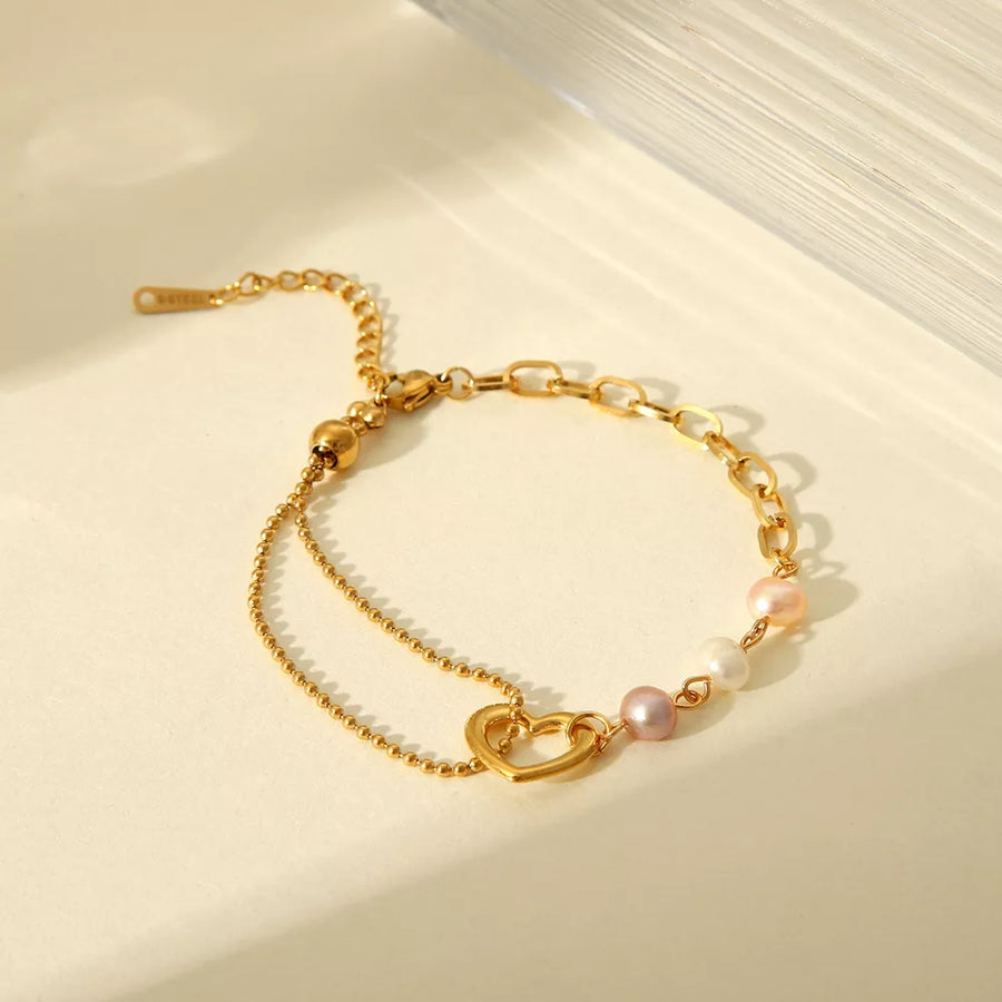 Freshwater Pearl, 18K Gold-Plated, Stainless Steel Care instructions: Avoid wear bracelet in light pink with layered