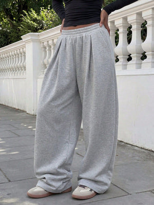 light gray sweatpants with full-length and elastic