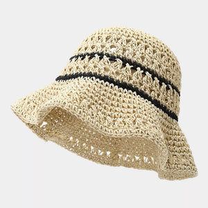 hat in beige featuring woven texture and bucket fit