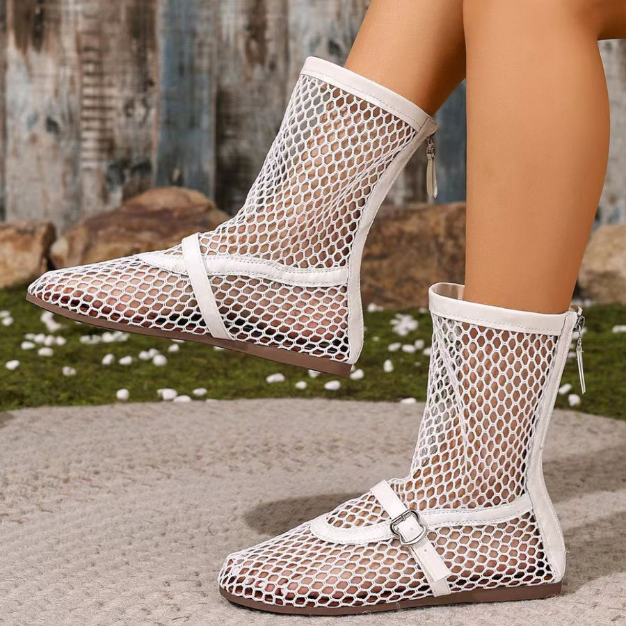 White mesh ankle sandals with buckle detail and zipper closure.