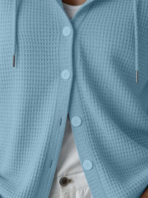 Tan cardigan featuring waffle-knit and waffle knit