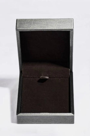 Open gray jewelry box with dark brown velvet lining