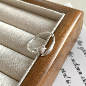 Silver ring with open and floral