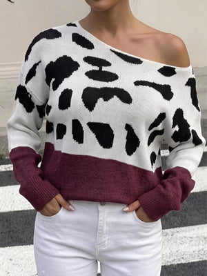 pullover sweater in white with cow-print and one-shoulder