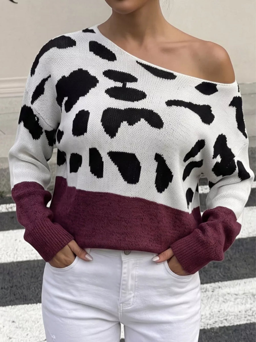 pullover sweater in white with cow-print and one-shoulder