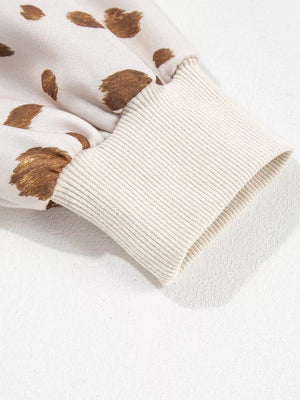 cream sweatshirt with ribbed cuffs and long sleeve