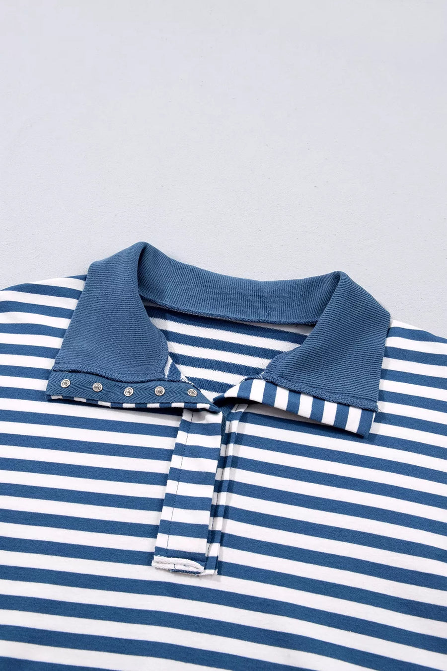 royal blue sweatshirt with half-button and striped
