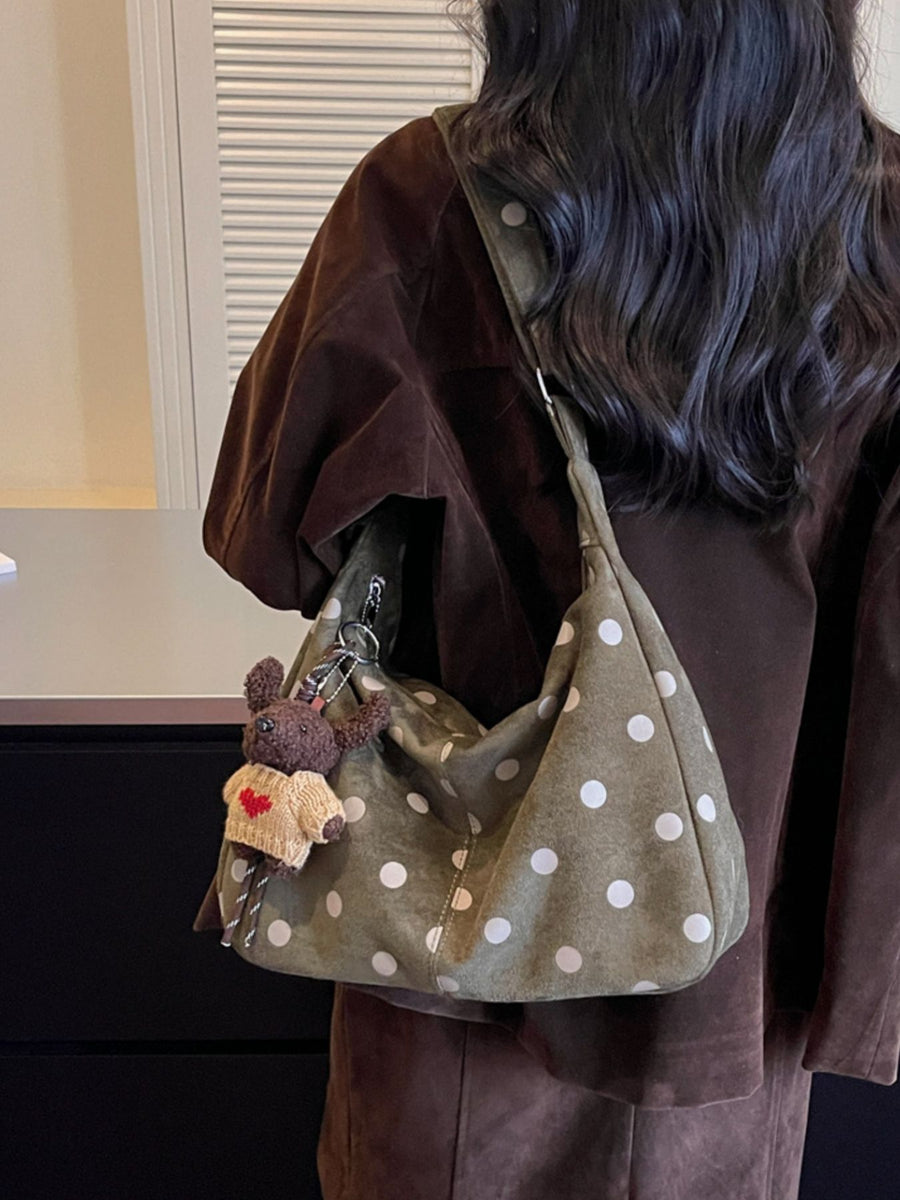 handbag in Green with polka dot and zipper closure