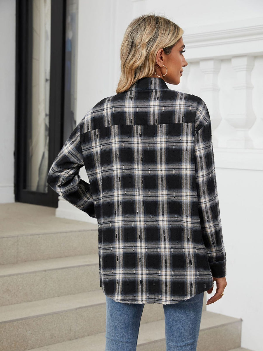 Black plaid relaxed fit overshirt with distressed details.