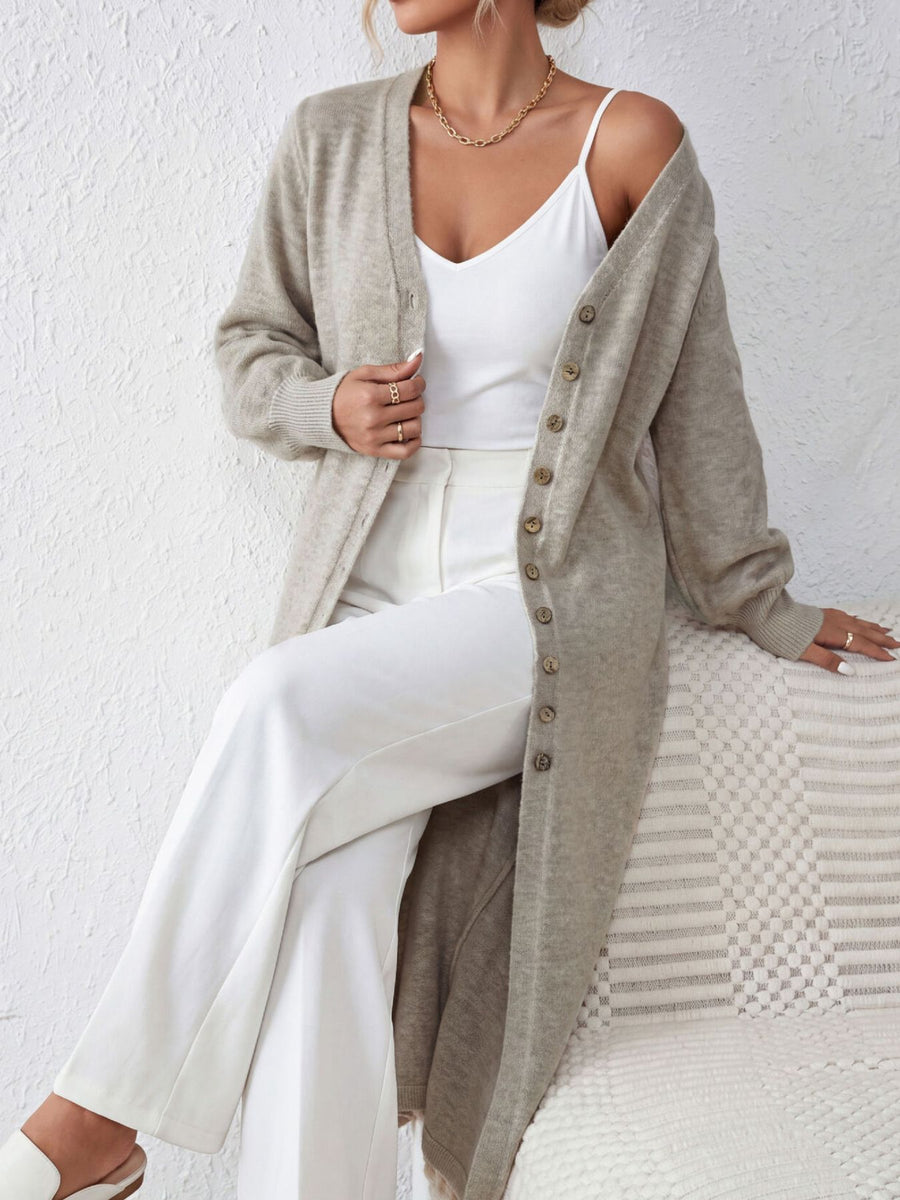 100% polyester Care instructions: Machine wash cold cardigan in Dark Brown with relaxed silhouette