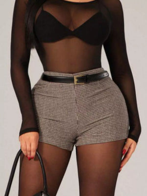 Chic houndstooth high-waisted shorts with a black belt.
