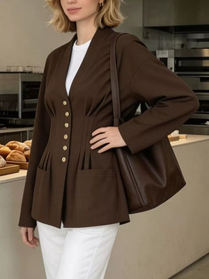 blouse in dark brown featuring buttoned and relaxed fit