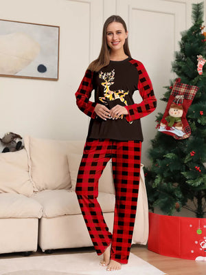black pajama set featuring reindeer graphic and plaid