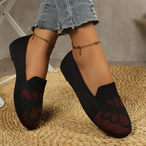 burgundy slip-on shoes featuring breathable and abstract-print