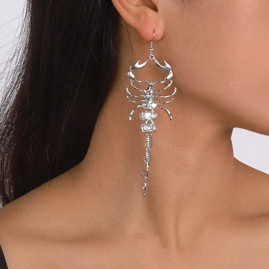 silver earrings with animal motif and not applicable