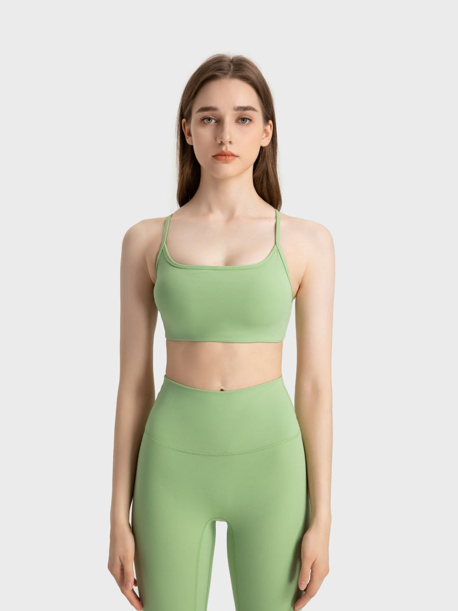 Strappy back active crop top in Yellow-Green with a square neckline.