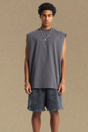 Boxy shoulder cut tank top in dark gray, a casual activewear staple.