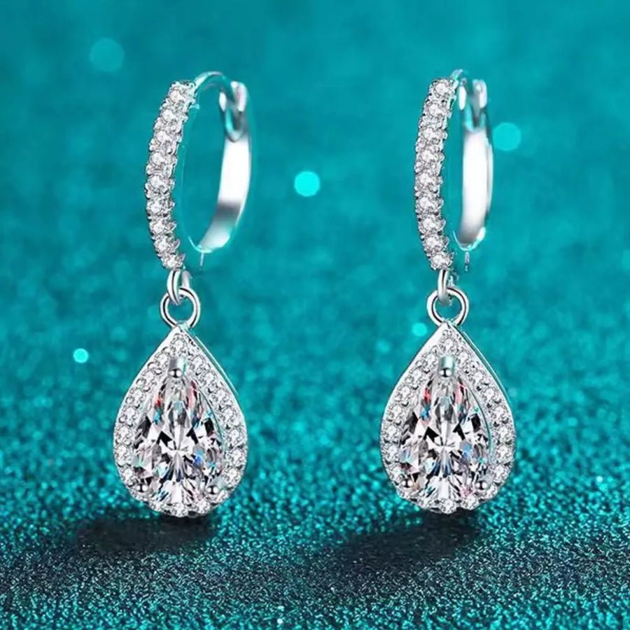 925 sterling silver,Moissanite Carat weight: 1ct Care instructions: Avoid wearin earrings in clear with dangle silhouette