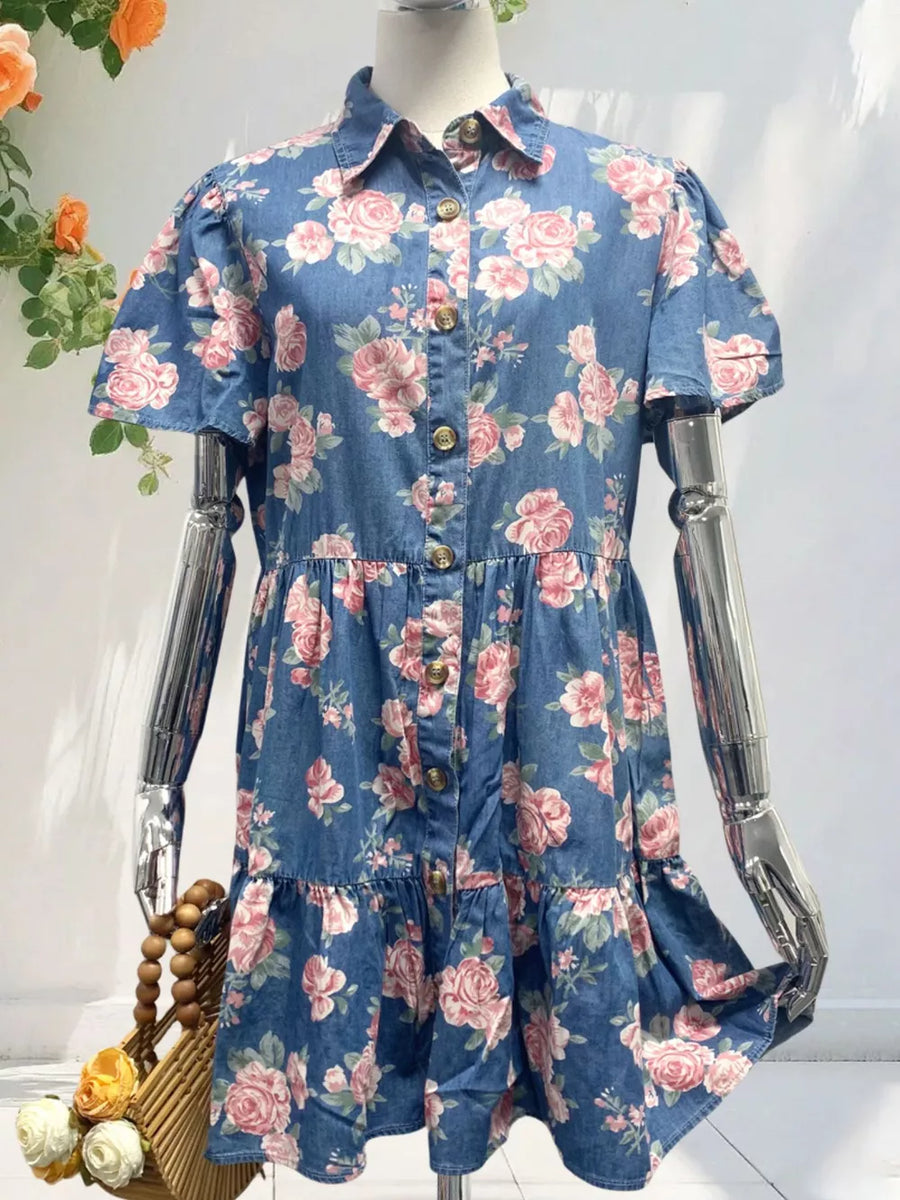 Denim floral mini dress with ruffled tiers and button front.