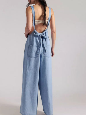 Black jumpsuit with gathered neckline and sleeveless