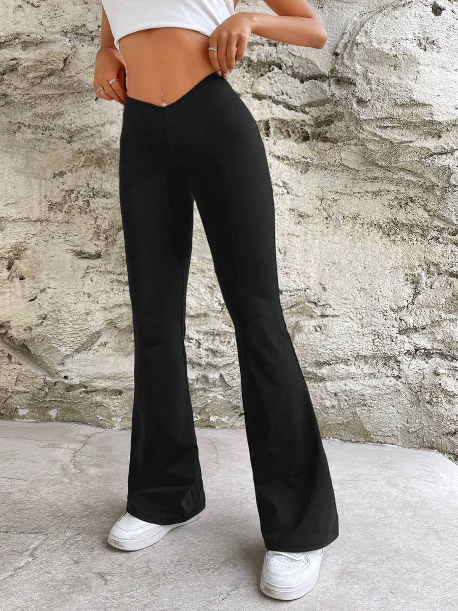 100% polyester Care instructions: Machine wash cold flare pants in Black with flared silhouette