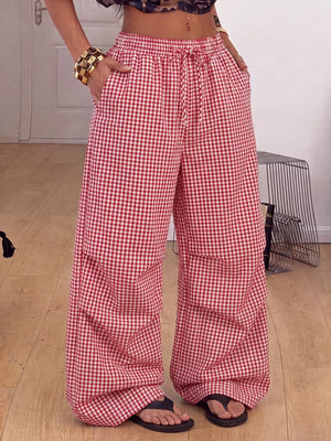 white wide-leg pants featuring drawstring waist and gingham