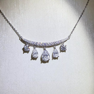 necklace in silver featuring teardrop pendants and straight fit