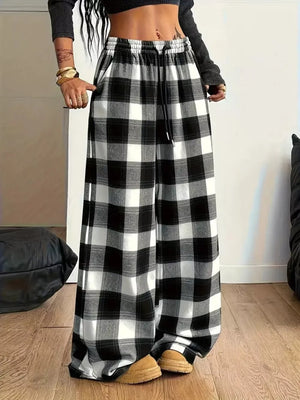 white wide-leg pants featuring drawstring and plaid