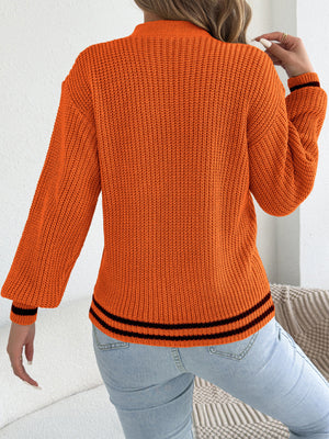 100% acrylic Care instructions: Machine wash cold pullover sweater in Burgundy with relaxed silhouette