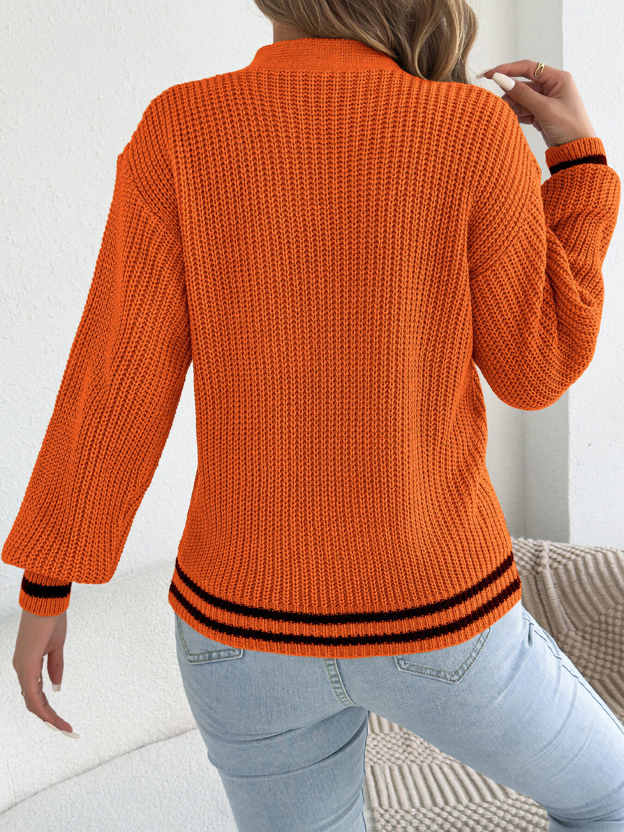 100% acrylic Care instructions: Machine wash cold pullover sweater in Burgundy with relaxed silhouette