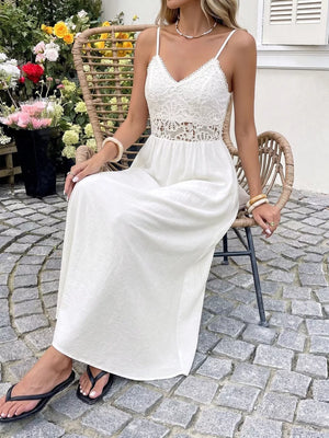 White lace-detail V-neck maxi dress with cutout waist and spaghetti straps.