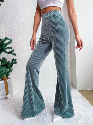 Peacock Blue corduroy high-waist flare maternity pants with vertical ribbing.