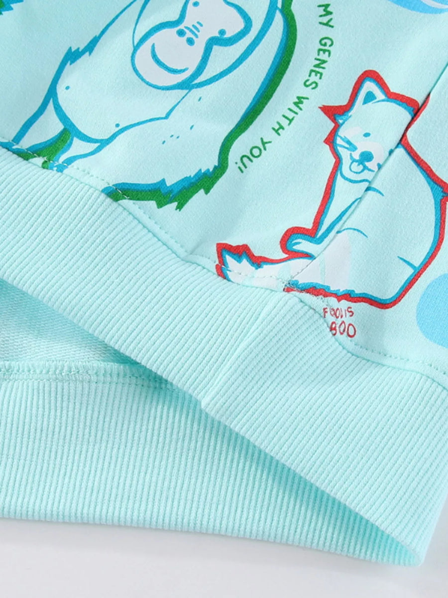 Mint blue cotton blend sweatshirt with playful animal print and text detail.